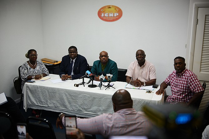 (Seated from left:) JCNP secretary Natasha Lightbourne-Dillet, legal counsel Kahlil Parker, chairman Dion Miller, chairman of the Jcnp rules committee Rory Saunders and JCNP vice chair Trevor Pratt at the JCNP Office speaking on their ruling involving the Valley Boys group yesterday. Photos: Chappell Whyms Jr