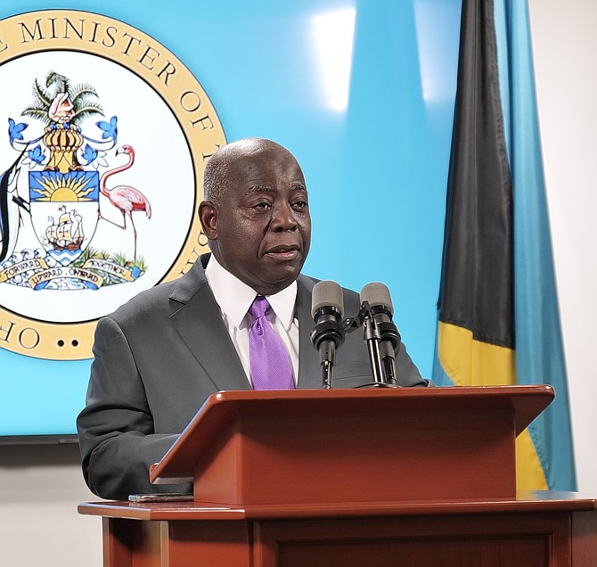 Prime Minster Davis addressing the press at the Office of the Prime Minister yesterday. Photo: Chappell Whyms Jr