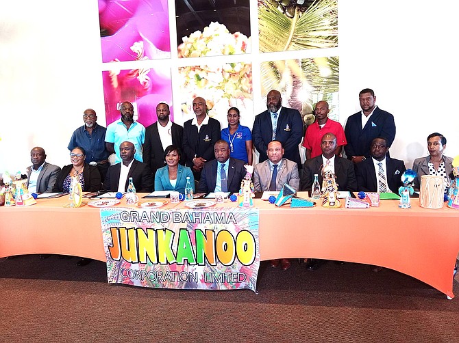 Minister for Youth, Sports, and Culture Mario Bowleg, Minister for Grand Bahama Ginger Moxey, and the Junkanoo Corporation of the Grand Bahama, along with Junkanoo leaders (standing in back)at the Pelican Bay Resort for the announcement of the New Year’s Junkanoo Parades and seed funding presentation on Monday in Grand Bahama. Photo: Denise Maycock