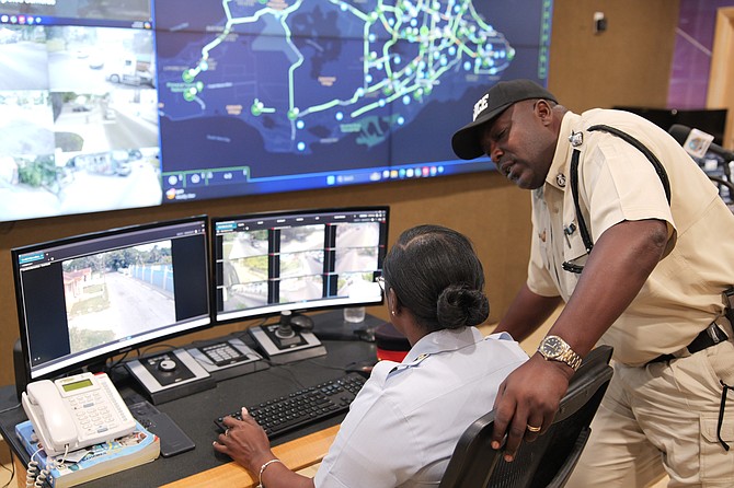 Officers monitoring CCTV cameras across Nassau at the Realtime Crime Centre on October 3, 2024.