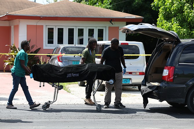 The scene on McKinney Drive off Carmichael Road after a man was shot dead at a residence. 
Photo: Dante Carrer/Tribune Staff