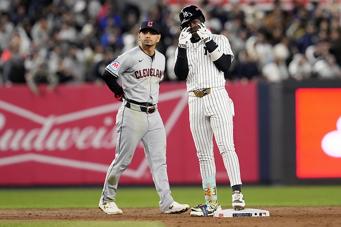 New York Yankees' Jazz Chisholm Jr. reacts after hitting a double against the Cleveland Guardians during the sixth inning in Game 2 of the baseball AL Championship Series Tuesday, Oct. 15, 2024, in New York. (AP Photo/Godofredo Vásquez)