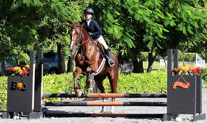 Marlo Pinder, of the CEC Blue Marlins, rode Laureanna CF in the Intermediate Equitation Over Fences class.