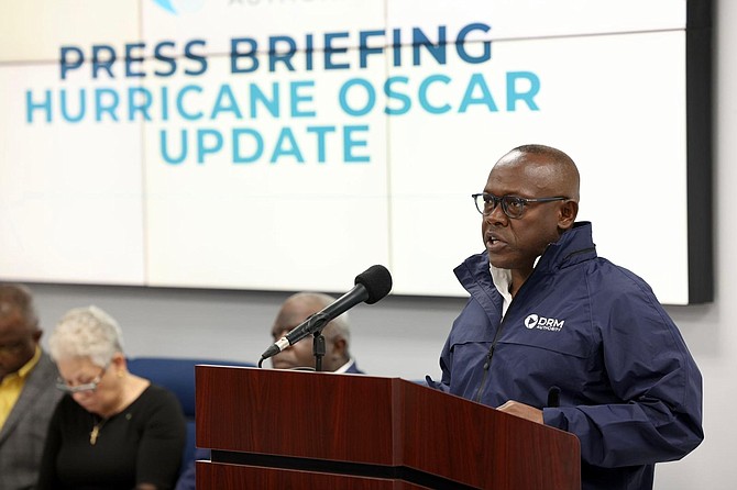 Acting Prime Minister Chester Cooper at Saturday's briefing on Hurricane Oscar. 

Photo: Dante Carrer/Tribune Staff