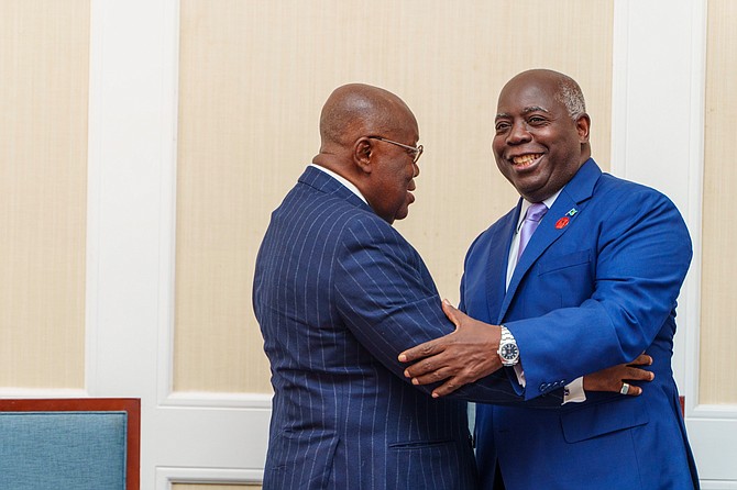Prime Minister Philip Davis greets President Nana Akufo-Addo of Ghana at a bilateral meeting.