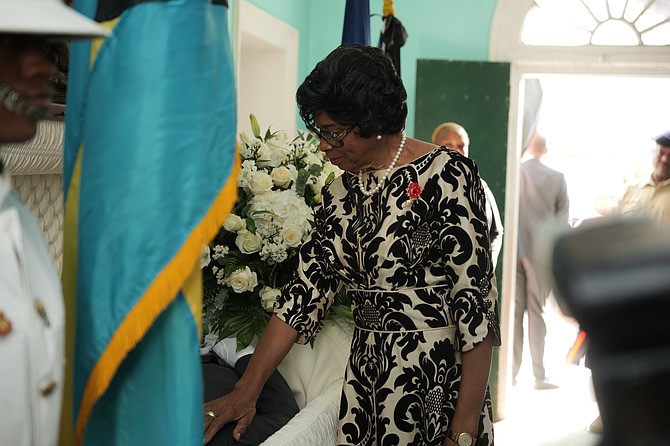 Governor General Dame Cynthia Pratt pays her respects to Philip Galanis. Photo: Nikia Charlton