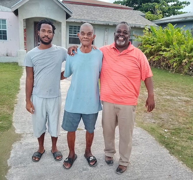 Wayne Rolle Jr (left) with his father Wayne Rolle (right) and grandfather is Kenley Martin (centre). Photo: Vandyke Hepburn