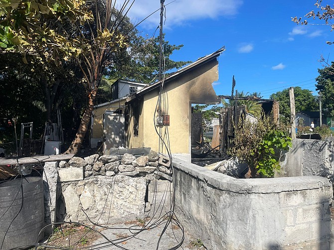 The fire-damaged home at Huyler Street.