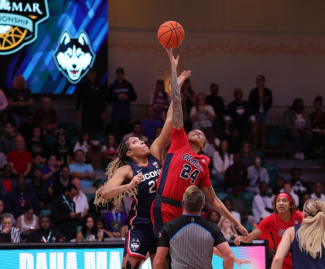 The University of Mississippi Rebels, coached by Bahamian Yolett McPhee-McCuin, suffered a 73-60 loss to the No. 2-ranked UConn last night in the Baha Mar Hoops Pink Flamingo Championship finale. Photo: Dante Carrer/Tribune Staff