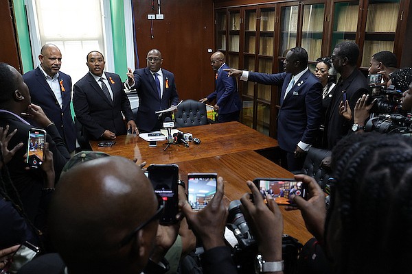 The Coalition of Independents (COI) leader Lincoln Bain interrupt Free National Movement (FNM) deputy leader Shanendon Cartwright, FNM Chairman Dr Duane Sands, Marco City MP and Opposition Leader Michael Pintard and East Grand Bahama MP Kwasi Thompson during a press conference in the Minority Room of the House of Assembly on November 27, 2024. Photo: Dante Carrer/Tribune Staff