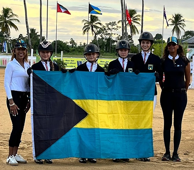 SHOWN, from left to right, are Cathy Ramsingh-Pierre, federation president, team members Hannah Knowles, Alana Pyfrom, Emma Johnston, Ella Saidi and assistant coach Erika Adderley.