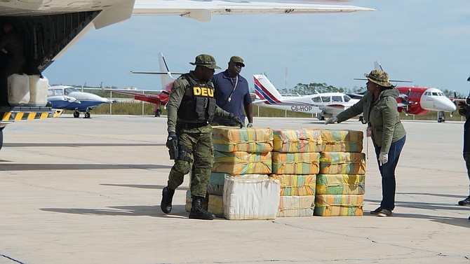 Cocaine worth over $15m was seized by police after a plane crash landed in Spring Point, Acklins, early Friday morning. The drugs are seen here after being transferred to the capital. Photo: Nikia Charlton