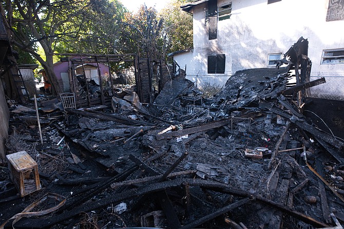 Damage as a result of a house fire which took place on Taylor Street next to Salem Church destroying two families homes in the process on Sunday. Photo: Chappell Whyms Jr