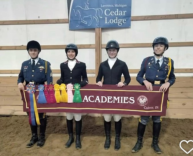 Sienna Jones, third from left, with her Culver Academies teammates, celebrate their High Point Team victory at the Cedar Lodge Horse Show. Jones won first and second place in the Junior Varsity Dressage Division.