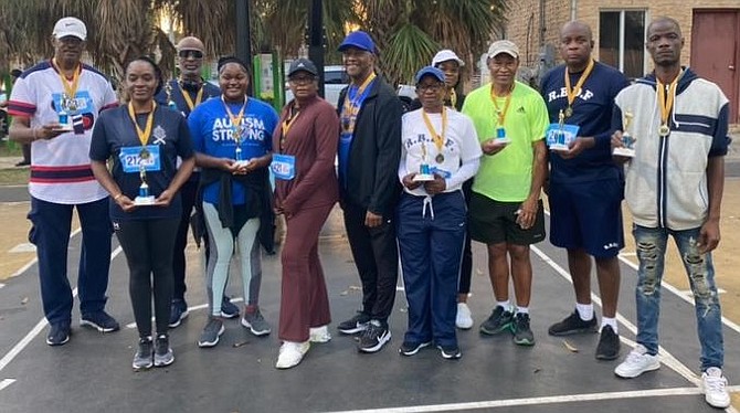 Some of the winners of the 5th annual Bains & Grants Town Dr Bernard Nottage road race.