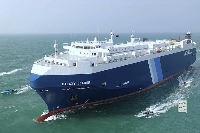 This photo released by the Houthi Media Center shows Houthi escort the cargo ship Galaxy Leader in the Red Sea off the coast of Yemen, Nov. 19, 2023. Photo: Houthi Media Center/AP