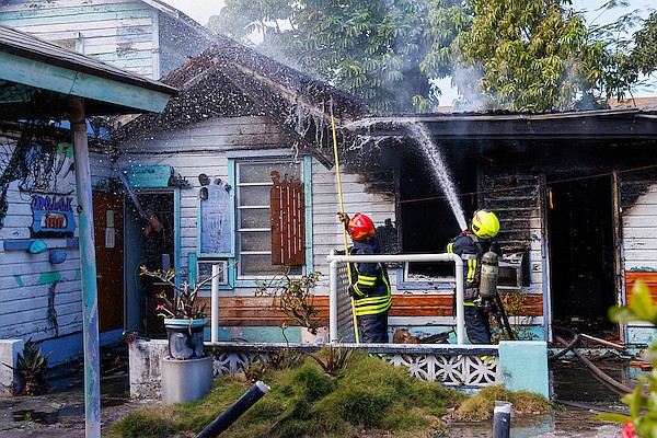 Firefighters work to extinguish a fire which broke out at Arawak Inn on West Bay Street on February 10, 2025. Photo: Dante Carrer/Tribune Staff