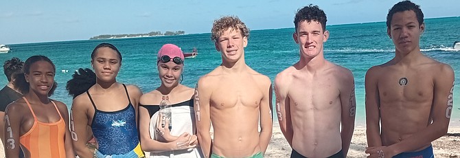 Top three female and male finishers Siann Isaacs, Madison Gilbert, Alanna Murray, William Farrington, Malcolm Menzies and Alexander Murray