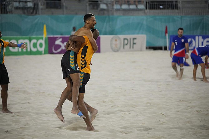 National beach soccer team players celebrate after beating USA on day 2 of the Concacaf Beach Soccer Championships on March 12, 2025. Photo: Chappell Whyms Jr