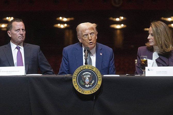 President Donald Trump attends a board meeting at the John F. Kennedy Center for the Performing Arts in Washington, Monday, March 17, 2025. (Pool via AP)