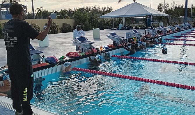CARIFTA swimming team members go through a gruelling workout session on Saturday morning at the Betty Kelly Kenning Swim Complex where the workout intensified under veteran head coach Travano McPhee.