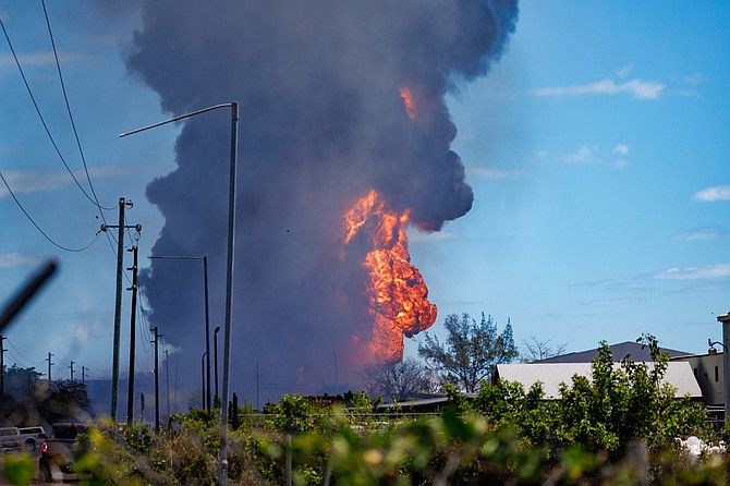 The blaze at the Department of Labour and other buildings on Monday, April 14. 
Photo: Dante Carrer/Tribune Staff