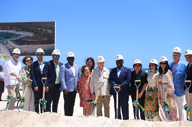Pictured at the ground-breaking ceremony for the Ritz-Carlton Reserve at Cotton Bay, from L to R, are: Dr Luis Carlos Sarmiento; Luz Angela Sarmiento Gutierrez; Julio Rojas Sarmiento; Clay Sweeting, minister of works and Family Island affairs; Chester Cooper, deputy prime minister and minister of tourism, investments and aviation; Fanny Gutierrez; Adriana Sarmiento Gutierrez; Luis Carlos Sarmiento senior; Prime Minister Philip Davis KC; Maria Claudia Sarmiento; Manuela Albir Sarmiento; Adelaide Albir Sarmiento; Brian King, president, Marriott International Caribbean and Latin America (CALA); and Daniel Zuleta, project director, Cotton Bay Holdings. (Photo by Sophia Taylor)