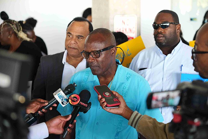 Bahamas Public Services Union (BPSU) president Kimsley Ferguson, speaks to media as Post Office employee protest at the Town Centre Mall over working conditions under Postmaster Shervonne Johnson on April 16, 2025. Photo: Nikia Charlton