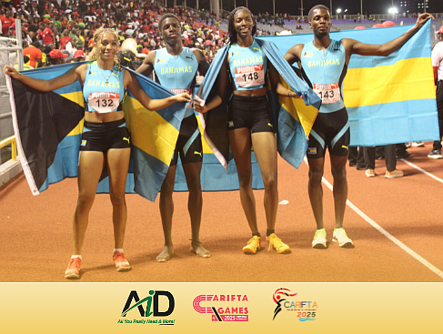 The Bahamian team of Makaiah Hitchman, Emmanuel Adams, Jamiah Nabbie and Zion Miller celebrate their mixed 4x400m victory on day one of the 2025 CARIFTA Games on April 19, 2025.