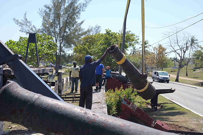 Cannons at Long Wharf being removed for restoration by AMMC. Photo: Nikia Charlton