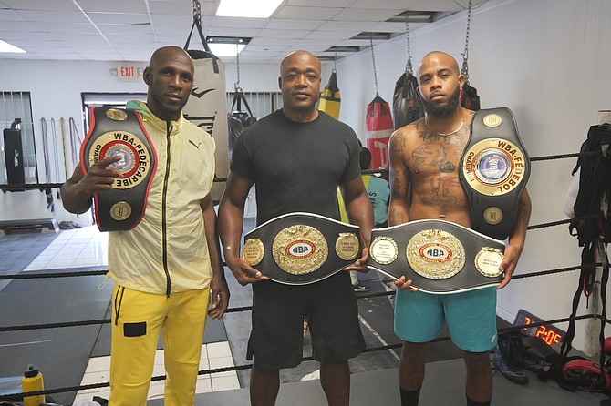 WARM WELCOME HOME: Shown, from left to right, are boxer Carl Hield, trainer/mentor Ronn Rodgers and boxer Rashield Williams.
Photo: Chappell Whyms Jr