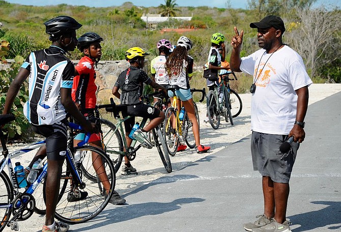 Barron Musgrove gives some last minute instructions to the junior cyclists.