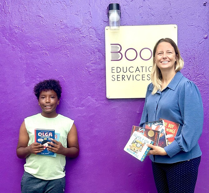 Caerwyn Turnquest, left, with Shar Hanson, of Boost Academy.