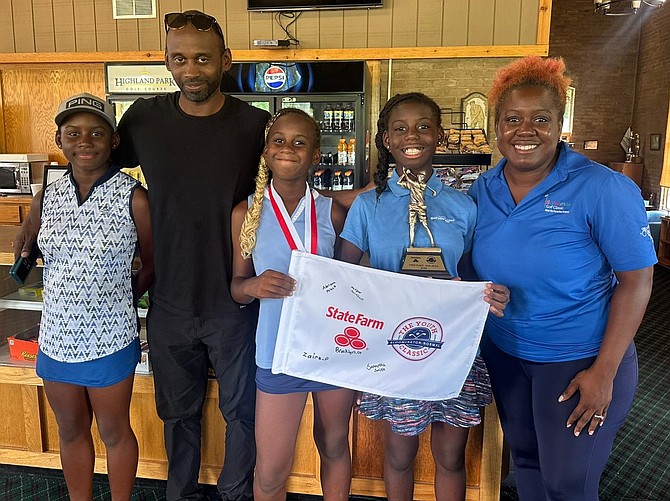 THE Poitier family, from left to right, Zion, father Philip, Zeden, Zaire and mother Denise.