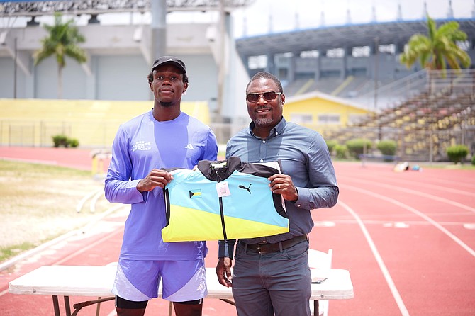Decathlete Kendrick Thompson, left, and BAAA president Drumeco Archer. Photos Chappell Whyms Jr
