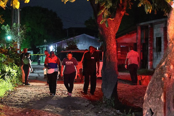 Police at the scene of a triple shooting that killed one woman and sent another woman and a young boy to the hospital near Columbus Primary School in the Wulff Road area in June 2025.  Photos: Dante Carrer/Tribune Staff