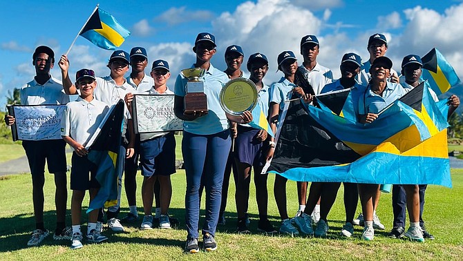 Team Bahamas, with Maddisson Carroll in the front holding the awards, celebrating their third-place finish in the 37th Caribbean Amateur Junior Golf Championships at the Grand Reserve Golf Club in Puerto Rico.