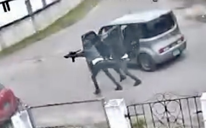 This is the dramatic moment two gunmen open fire on a crowd of friends, leaving two dead and five others injured with gunshot wounds. 
The gunmen -  one armed with an automatic rifle, and the other a handgun - jumped out of a car and started shooting in the Robinson Road and Market Street area. Childhood friends Markentash Saintil and Eden Louis died at the scene. Five others were admitted to hospital.