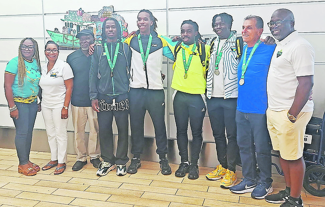 Bahamas executives greeting Team Bahamas on their return home from the Davis Cup tie in Trinidad & Tobago.