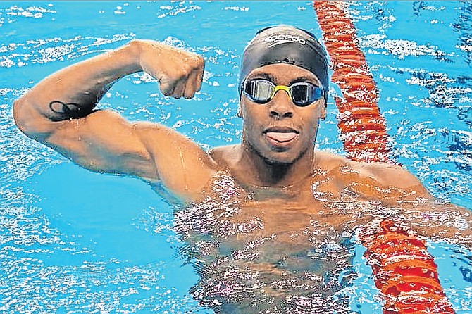 BRONZE SPLASH: Lamar Taylor muscles up after his bronze-medal swim yesterday at the 2025 Junior Pan American Games in Asuncion, Paraguay.