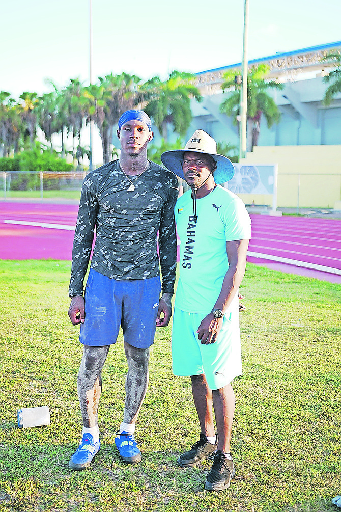KENNY Moxey Jr and his father.
Photo: Chappell Whyms Jr