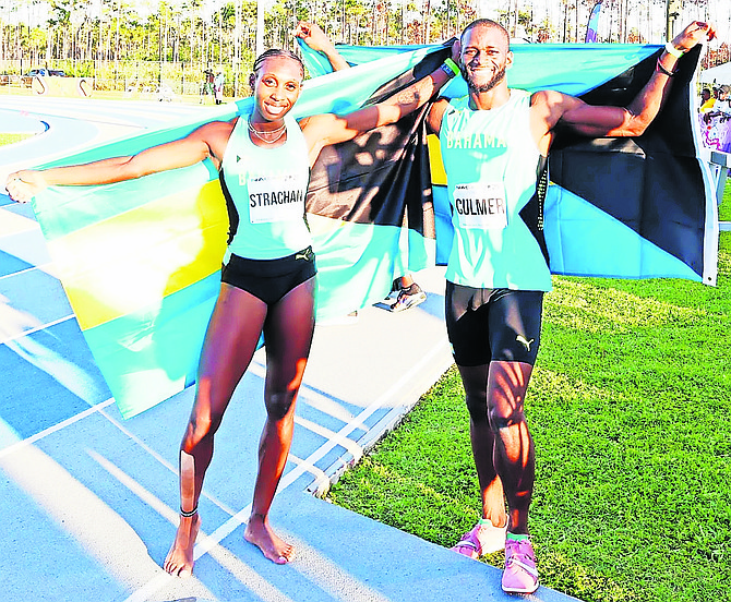 GOLD RUSH: Anthonique Strachan and Kaiwan Culmer proudly display our national flag at the fifth North American, Central American and Caribbean Track and Field Championships over the weekend.