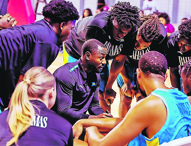 Coach Lourawls “Tum Tum” Nairn gives some instructions to the men’s national basketball team in Nicaragua.