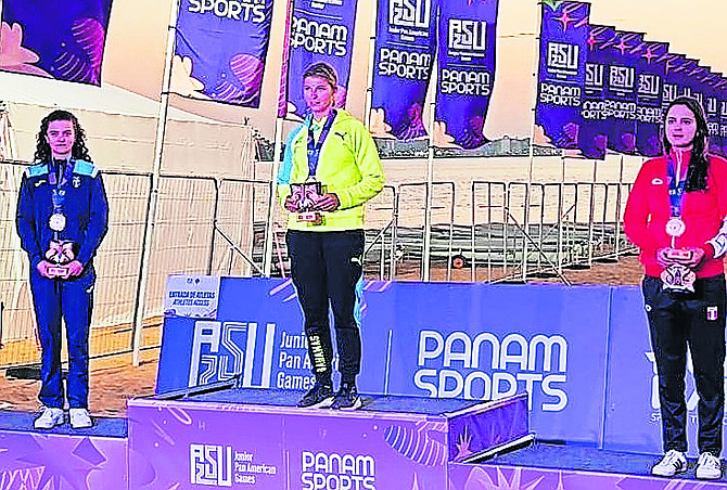 STRIKING GOLD: Eliza Denning with her gold medal on the podium at the second Junior Pan American Games in Asunción, Paraguay.