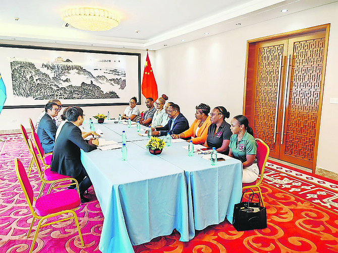 Chinese Ambassador Yian Jiarong (second from left) meets with delegation of business owners, led by Bahamas China Friendship Association head Donovan Moxey.
