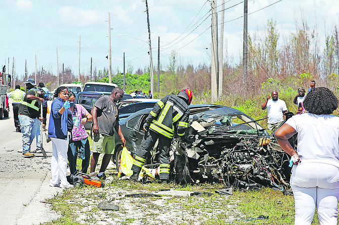 Fire services work to extract victims of a traffic accident from a vehicle on Warren Lavarity Highway in Grand Bahama on August 18, 2025. Photo: Vandyke Hepburn