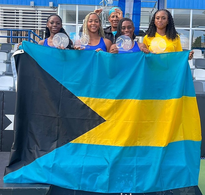 TEAM Bahamas on the medal podium, from left to right, Jalisa Clarke, Saphirre Ferguson, captain Kim O’Kelley, Sydney Clarke and Simone Pratt.