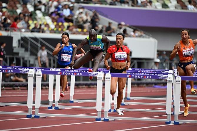 Charisma Taylor in action in the women’s 100 metre hurdles at the 20th World Outdoor Championships in Tokyo, Japan.
                                                                                                                                                                        Photo: Kermit Taylor