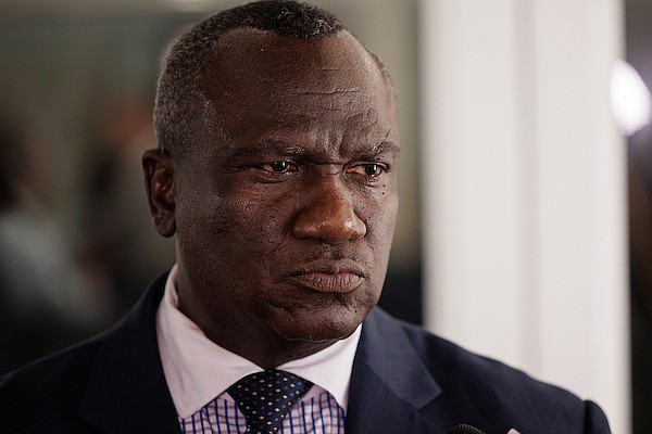 Bishop Delton Fernander speaks to reporters during the grand opening of the cruise line’s new office downtown on September 23, 2025. Photo: Dante Carrer/Tribune Staff