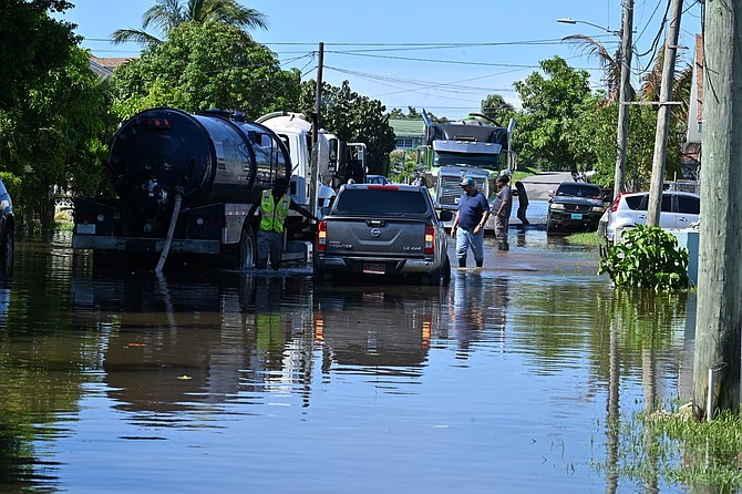 Pumps were deployed in Pinewood Gardens to relieve the flooding in the aftermath of Tropical Storm Imelda on September 30, 2025, (BIS Photos/Kemuel Stubbs)